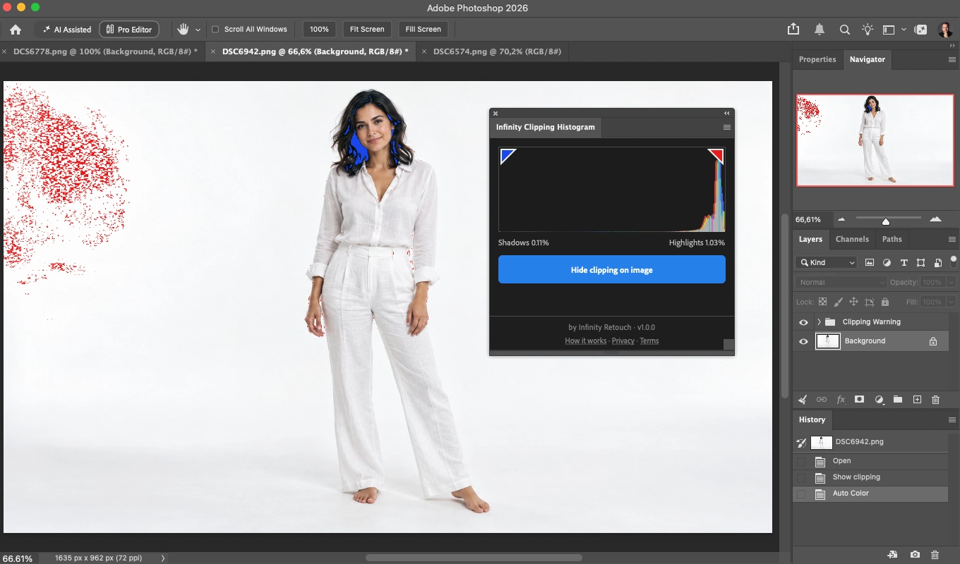 A full-length photo on a white studio background with the Clipping Warning on: red specks across the backdrop, blue in the dark hair, and the panel showing 1.03% highlights and 0.11% shadows.